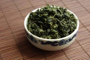فوجیان اولانگ کراوات گوان یین (الهه آهنین رحمت) چای چینی کراوات گوان یین خواص
