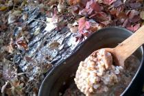 Kulesh or field millet porridge in lard, cooked on a fire